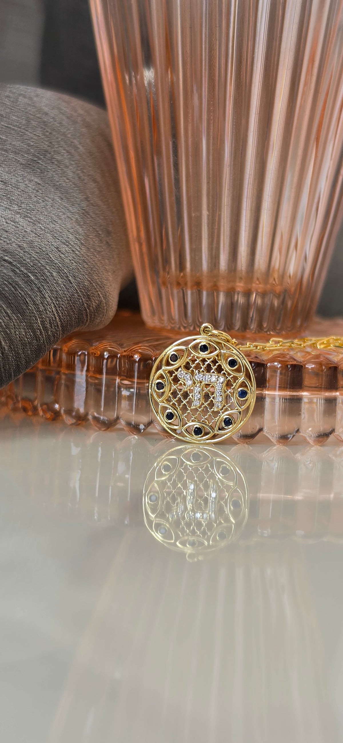 Hai and eye pendant