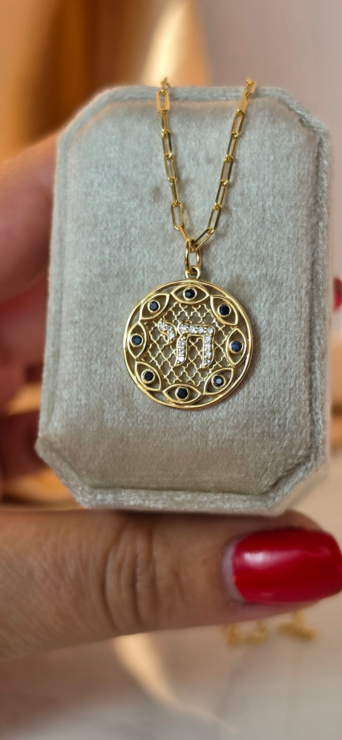 Hai and eye pendant