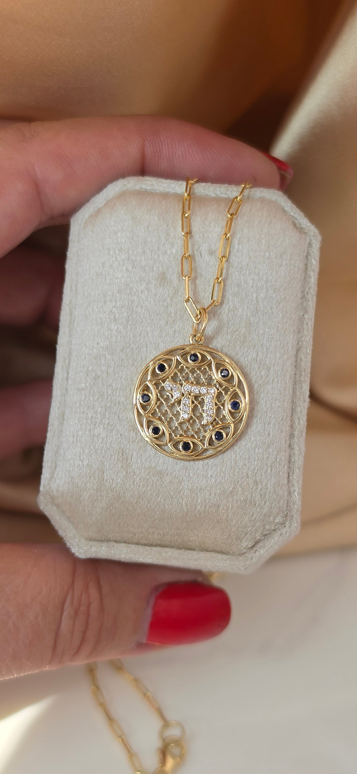 Hai and eye pendant