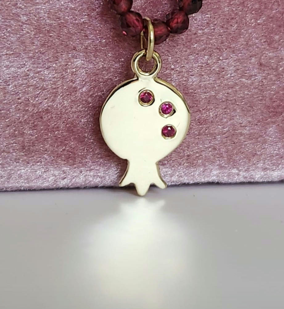 pomegranate charm only in 14k gold set with natural ruby's