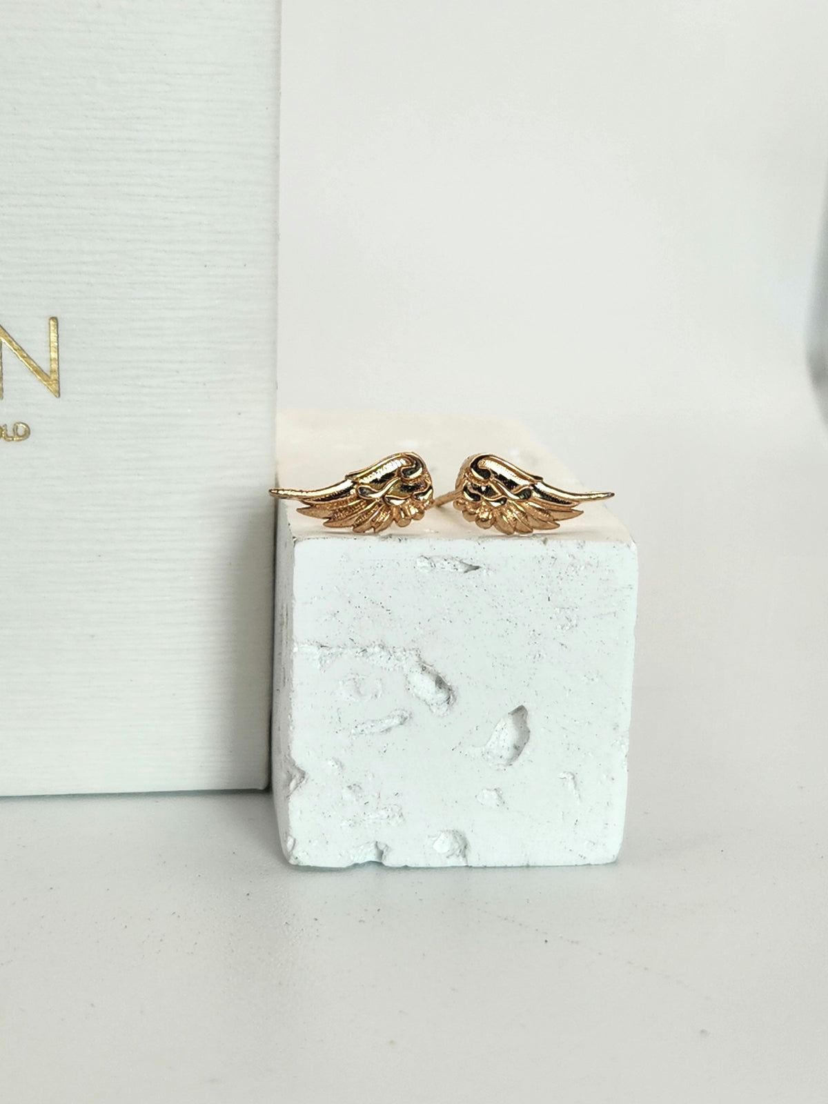 Wing stud earrings 14k rose gold.