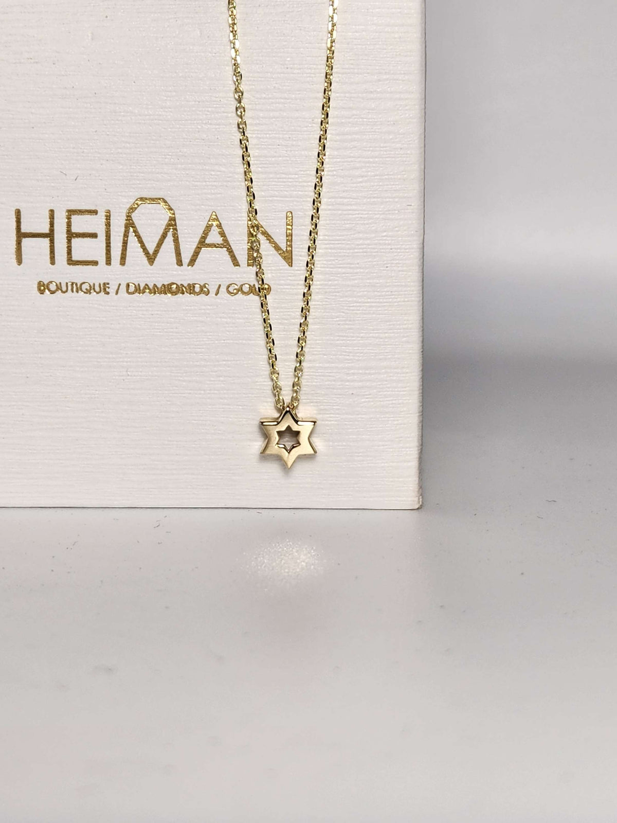 Mini Star of David necklace 7mm wide 14k, comes on 14k chain.