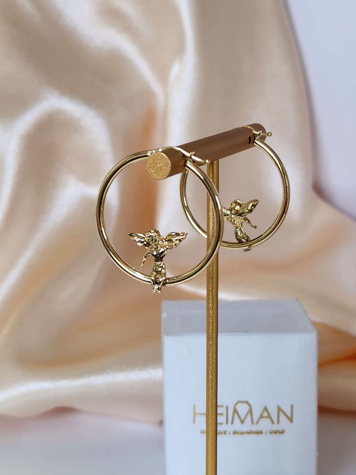 Angel hoop earrings 14k yellow gold.