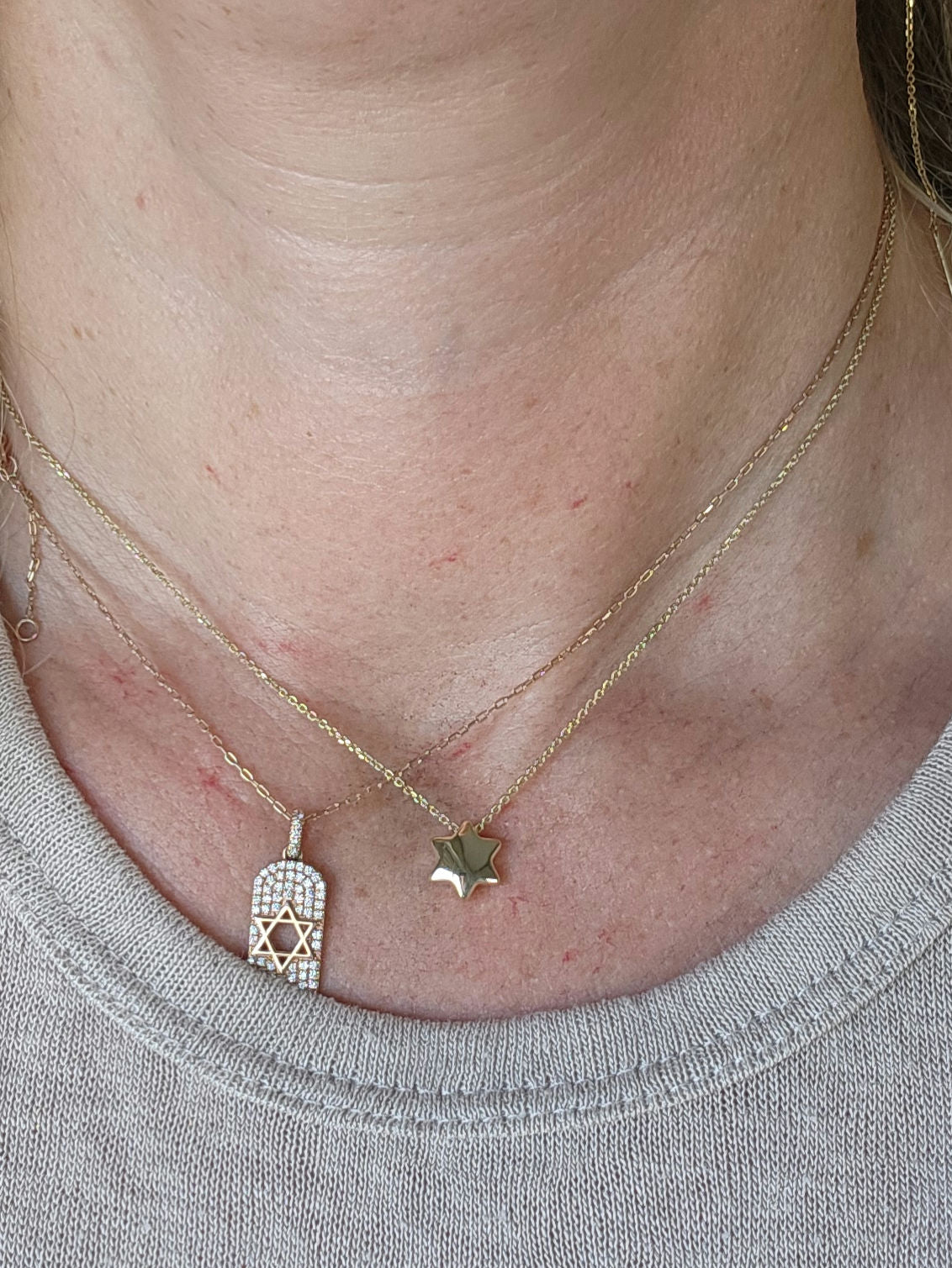 Bubble Star david necklace comes on 18 inch 14k chain.