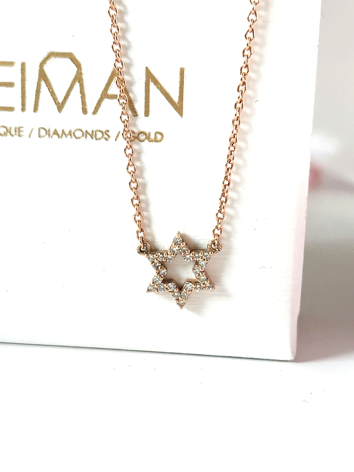 Star of David necklace 14k set with natural diamonds 0.17 carat.