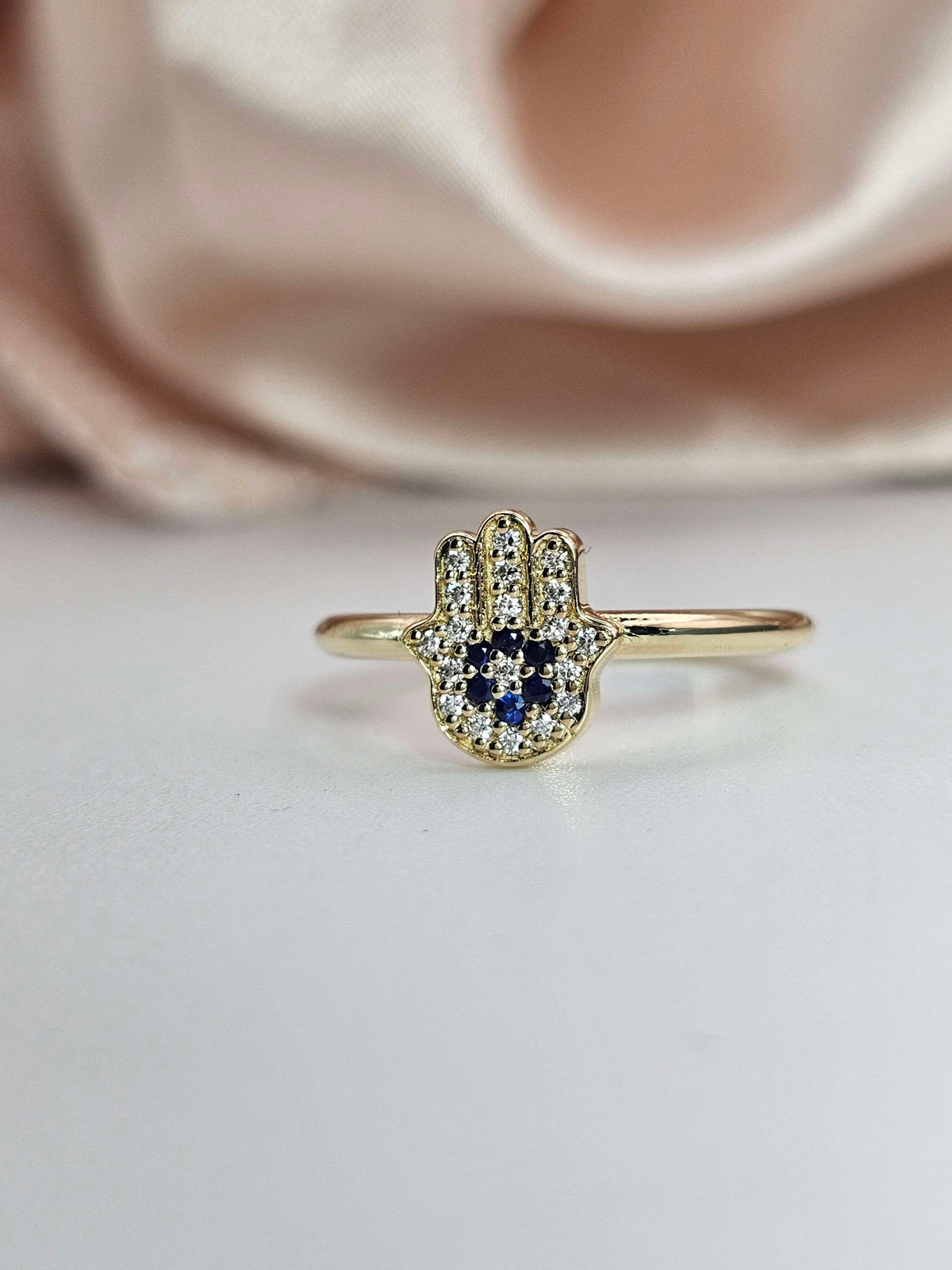 Hamsa ring "Miriam" 14k gold diamonds and sapphires