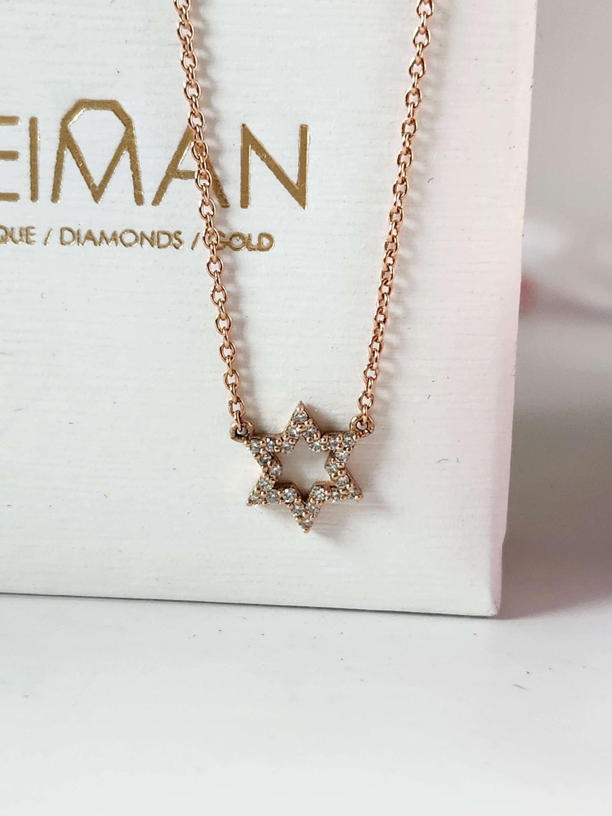 Star of David necklace 14k set with natural diamonds 0.17 carat.