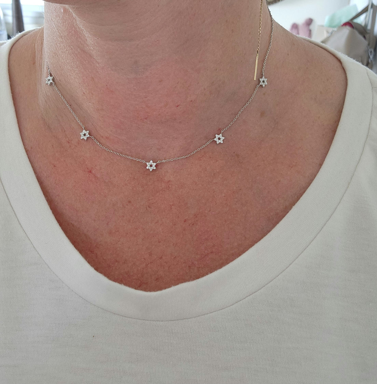 Five star of David necklace 14k gold set with diamonds.