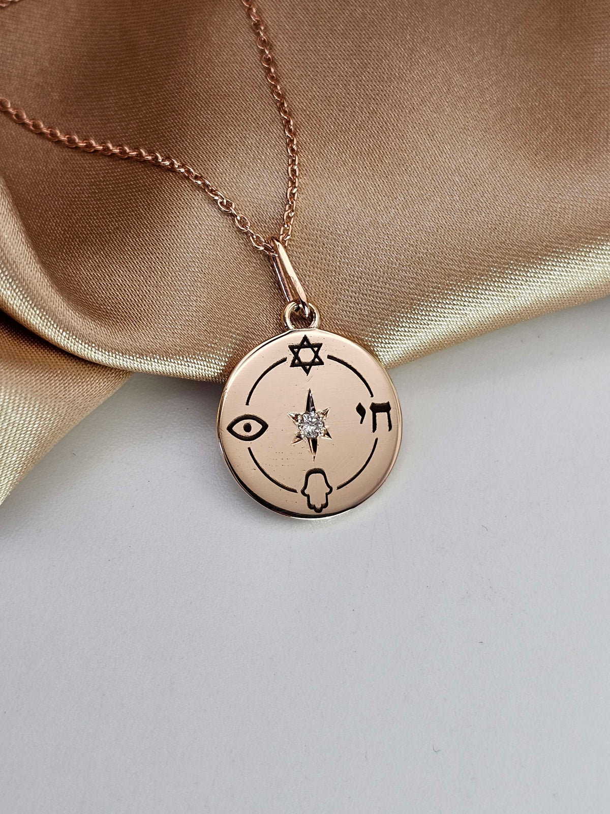 Small "Jewish compas" necklace, 14k gold set with natural diamond.