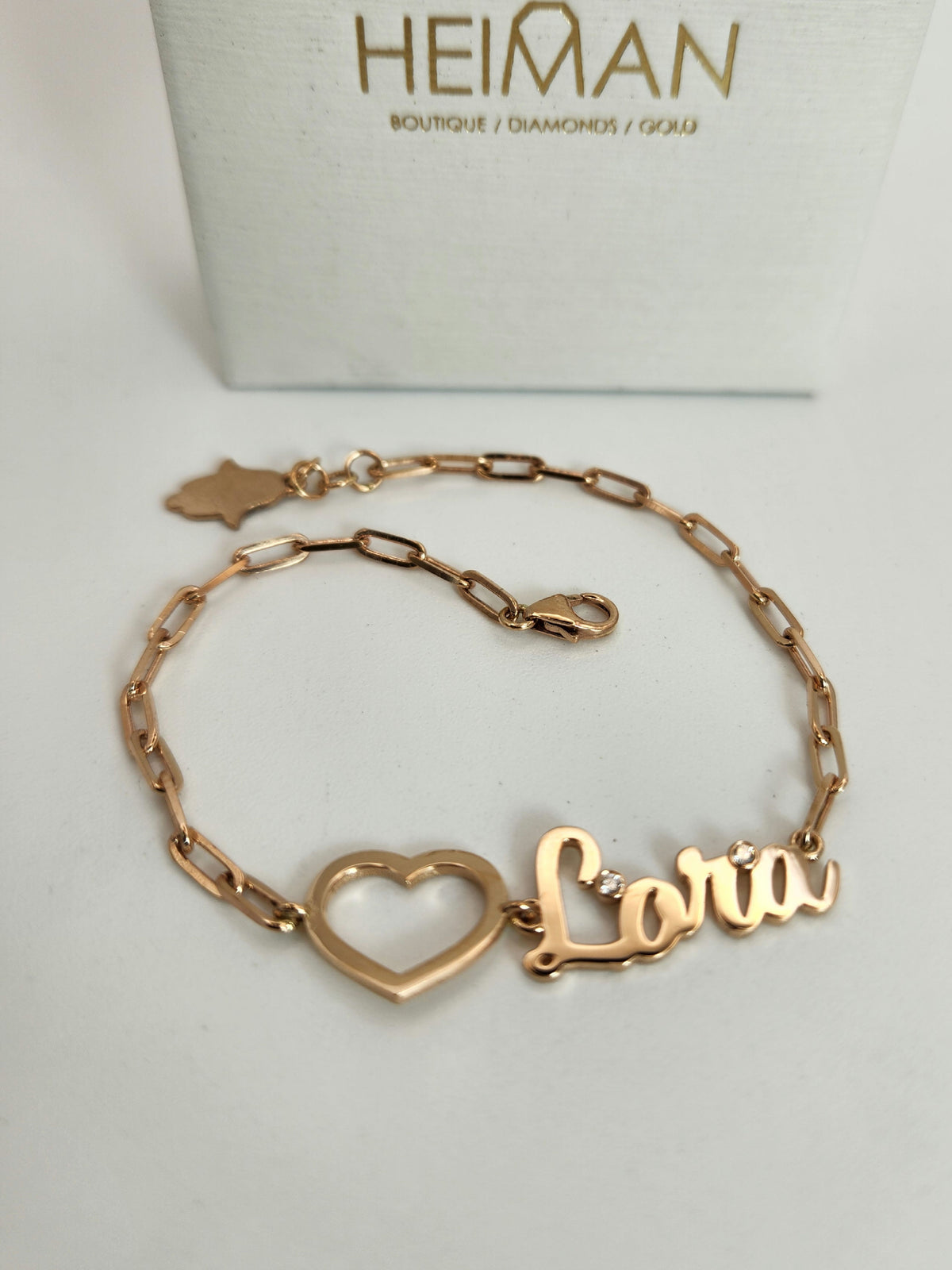 Gold heart and name bracelet 14k rose gold.