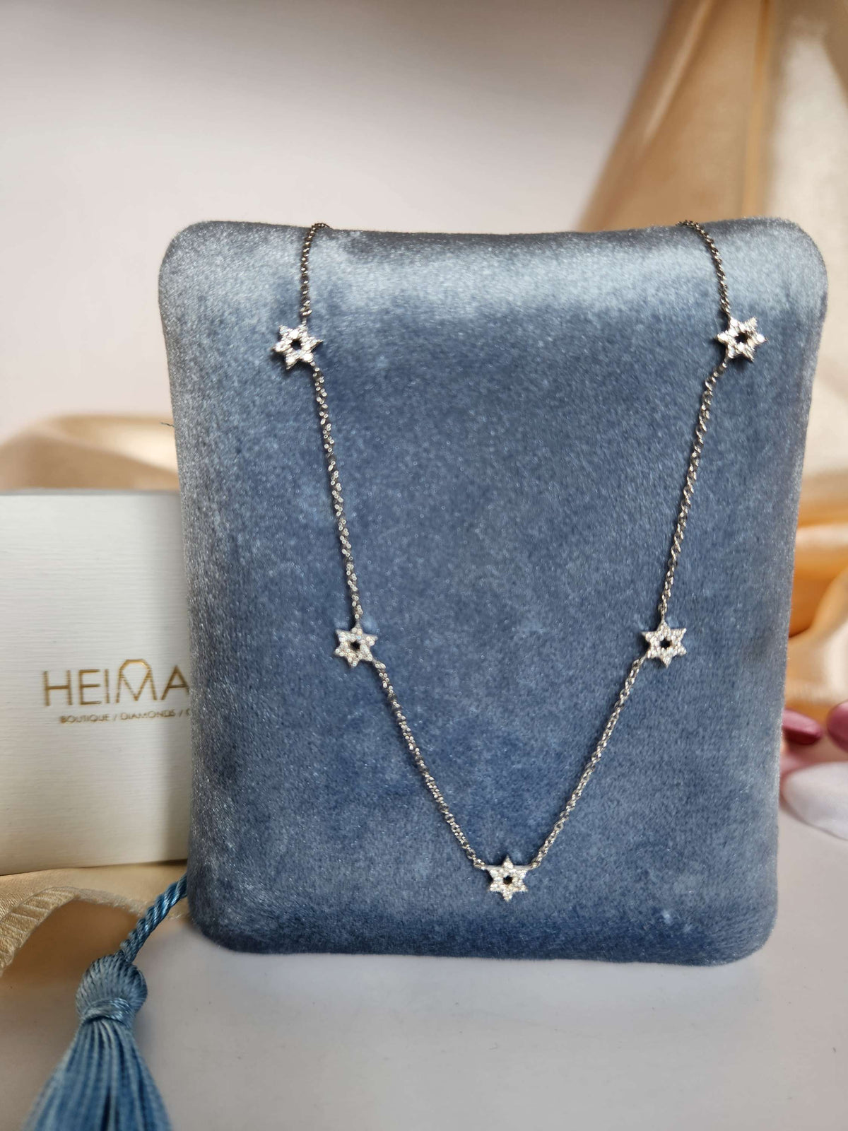 Five star of David necklace 14k gold set with diamonds.