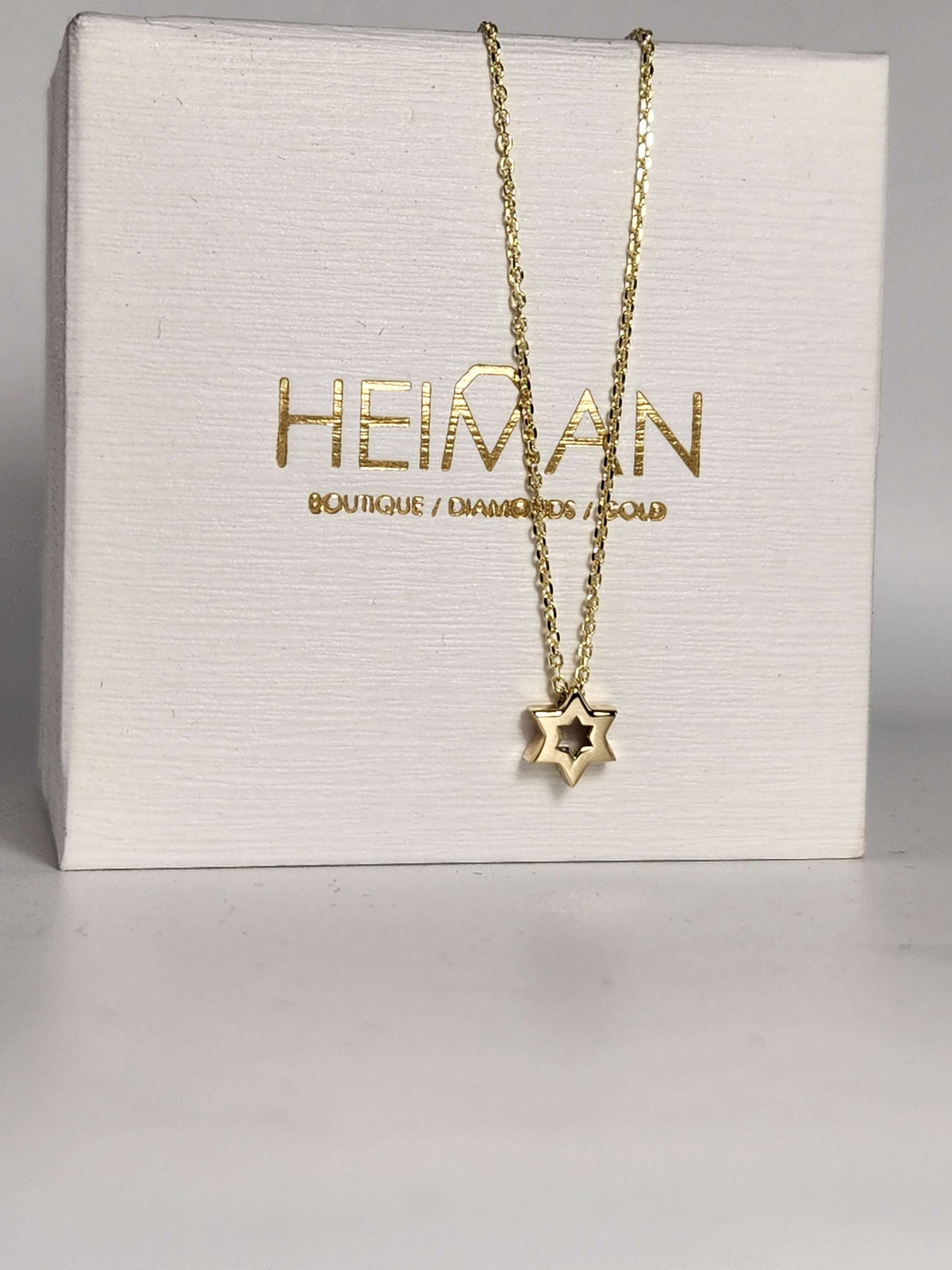 Mini Star of David necklace 7mm wide 14k, comes on 14k chain.