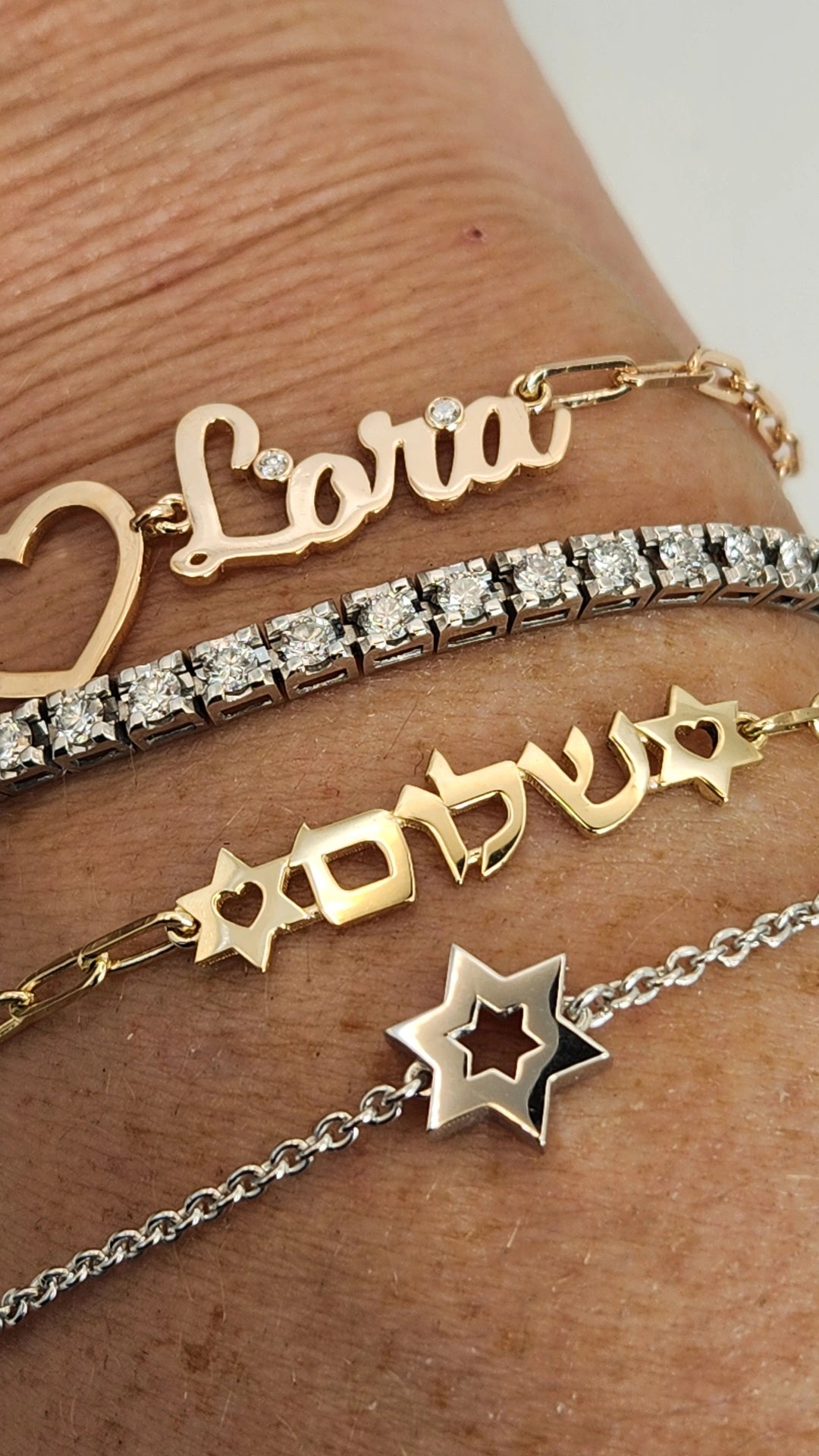 Gold heart and name bracelet 14k rose gold.