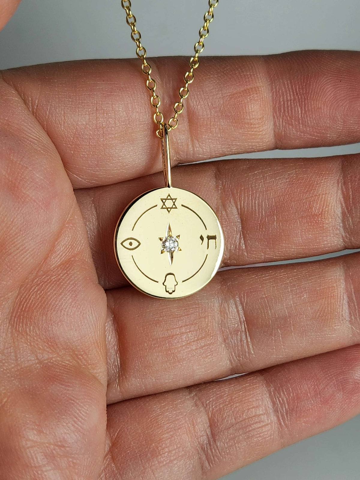 The "Jewish compas" only the pendant 14k