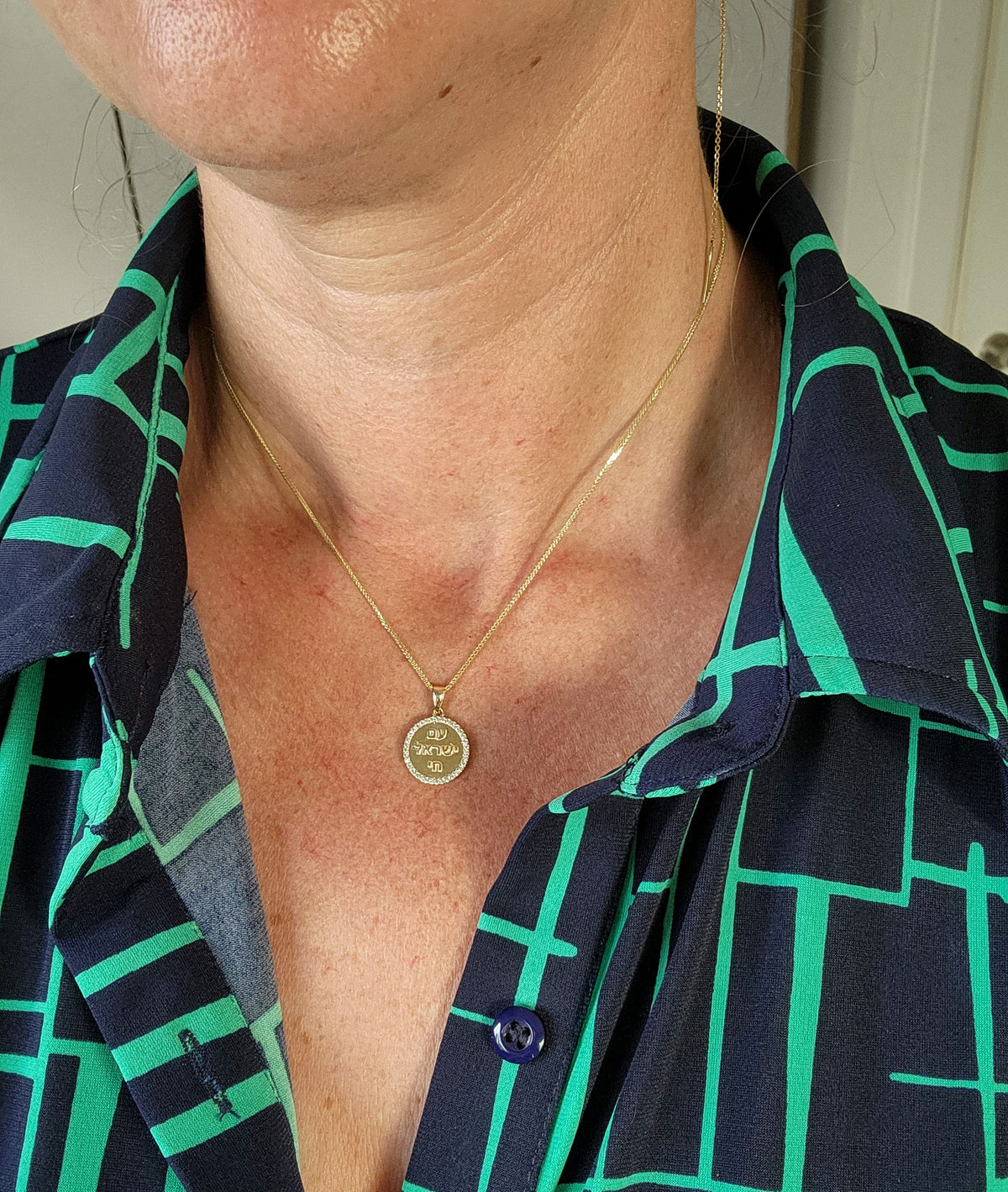 Am Israel Hai 14k gold pendant set with cvd diamonds on a 14k chain.