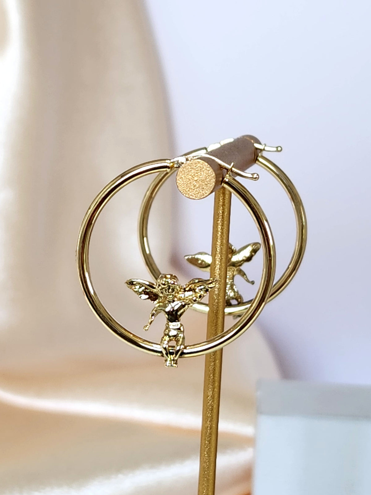 Angel hoop earrings 14k yellow gold.