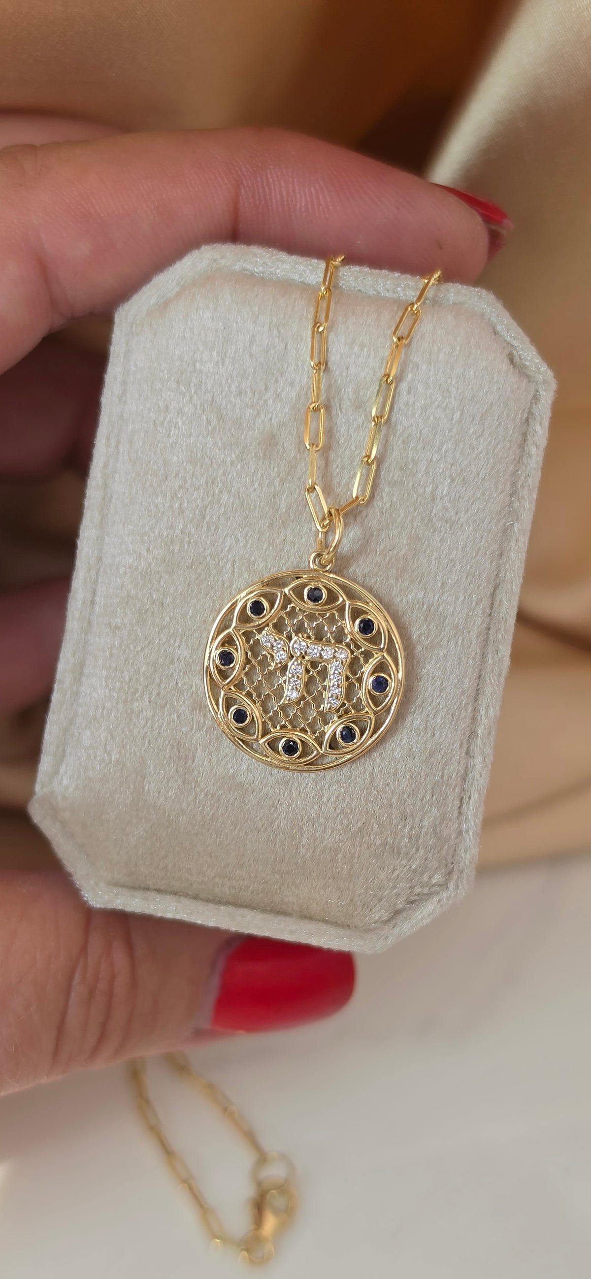 Hai and eye pendant
