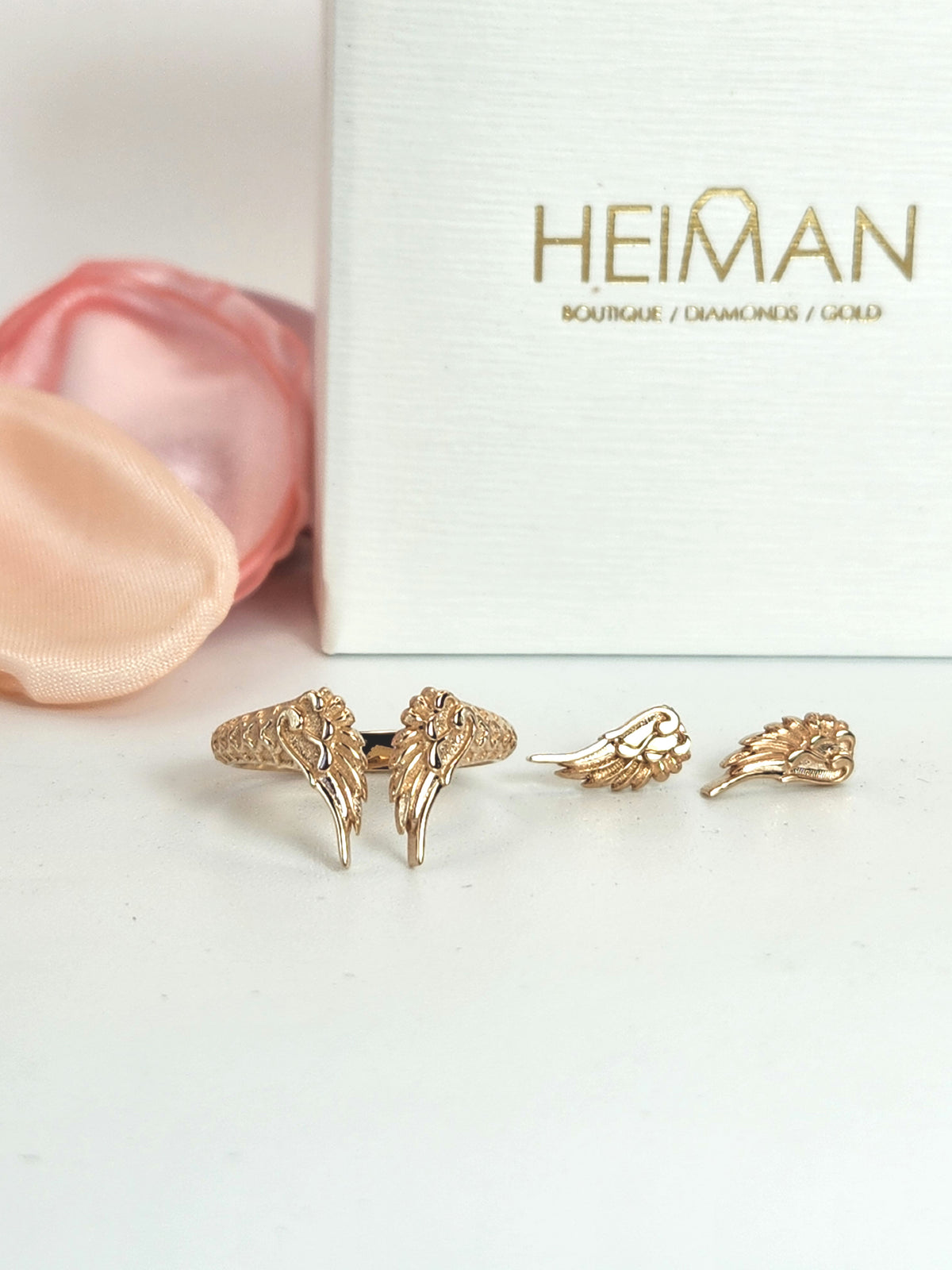 Wing stud earrings 14k rose gold.