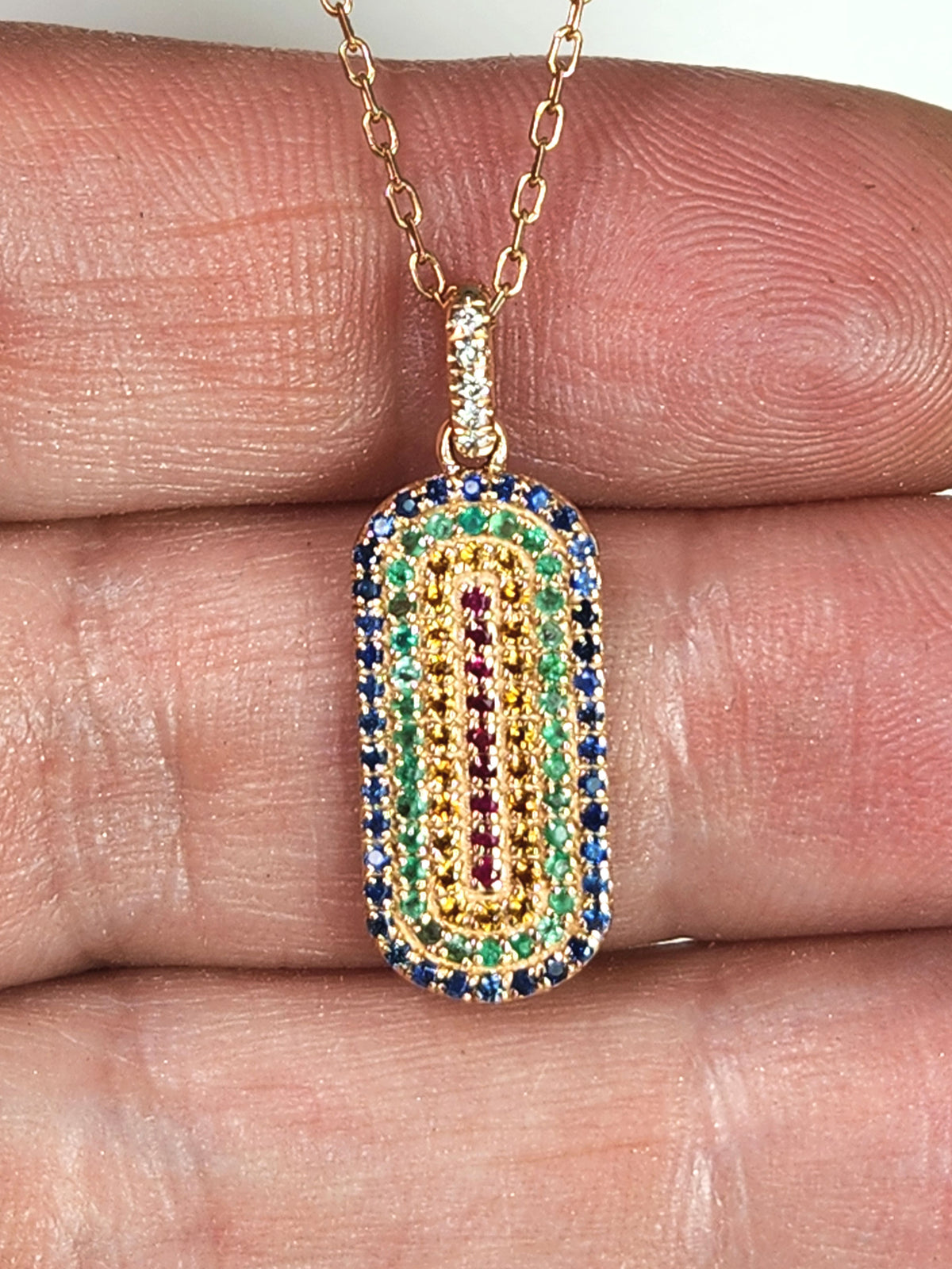 Gold tag necklace set with multi colored stones and diamonds 14k