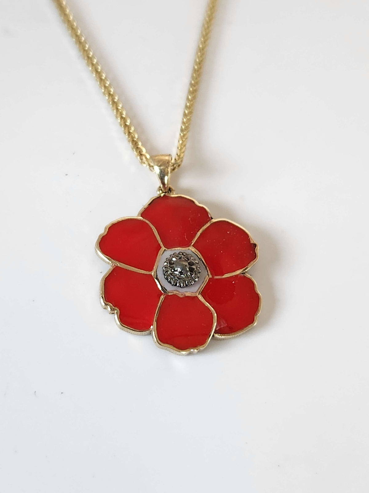 Poppyseed pendant,  14k yellow gold and enamel, comes on 14k chain.