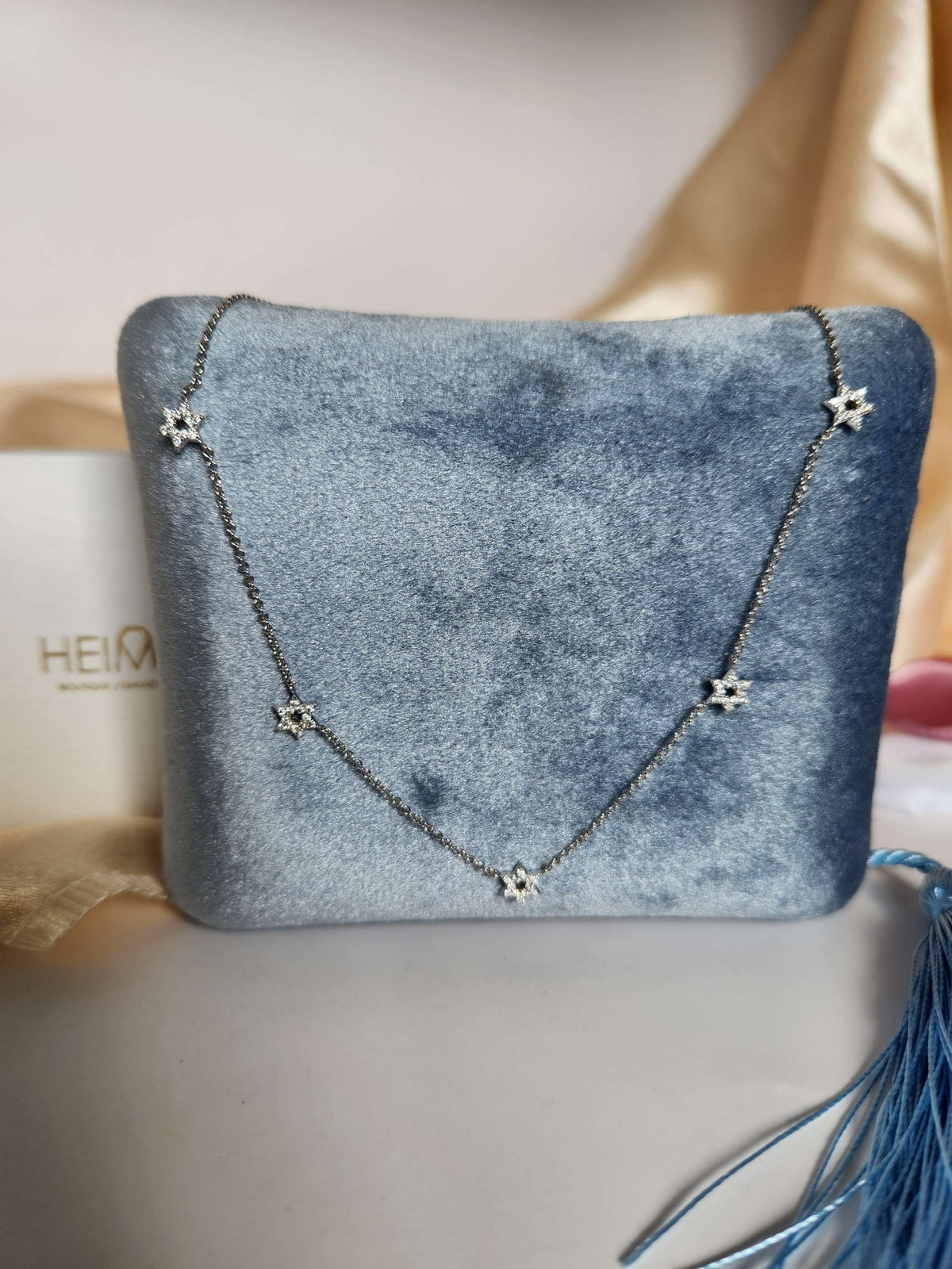 Five star of David necklace 14k gold set with diamonds.