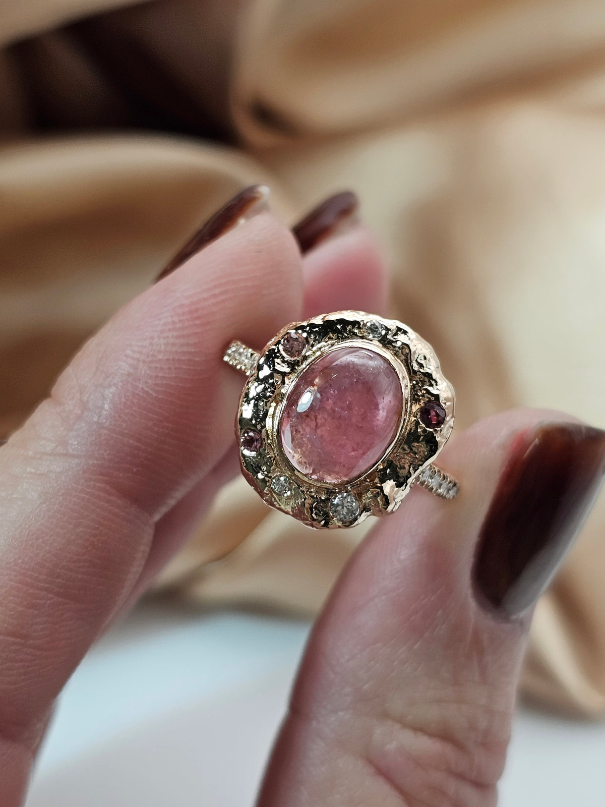 Pink tourmaline ring, 14k rose gold set with natural tourmaline and diamonds.