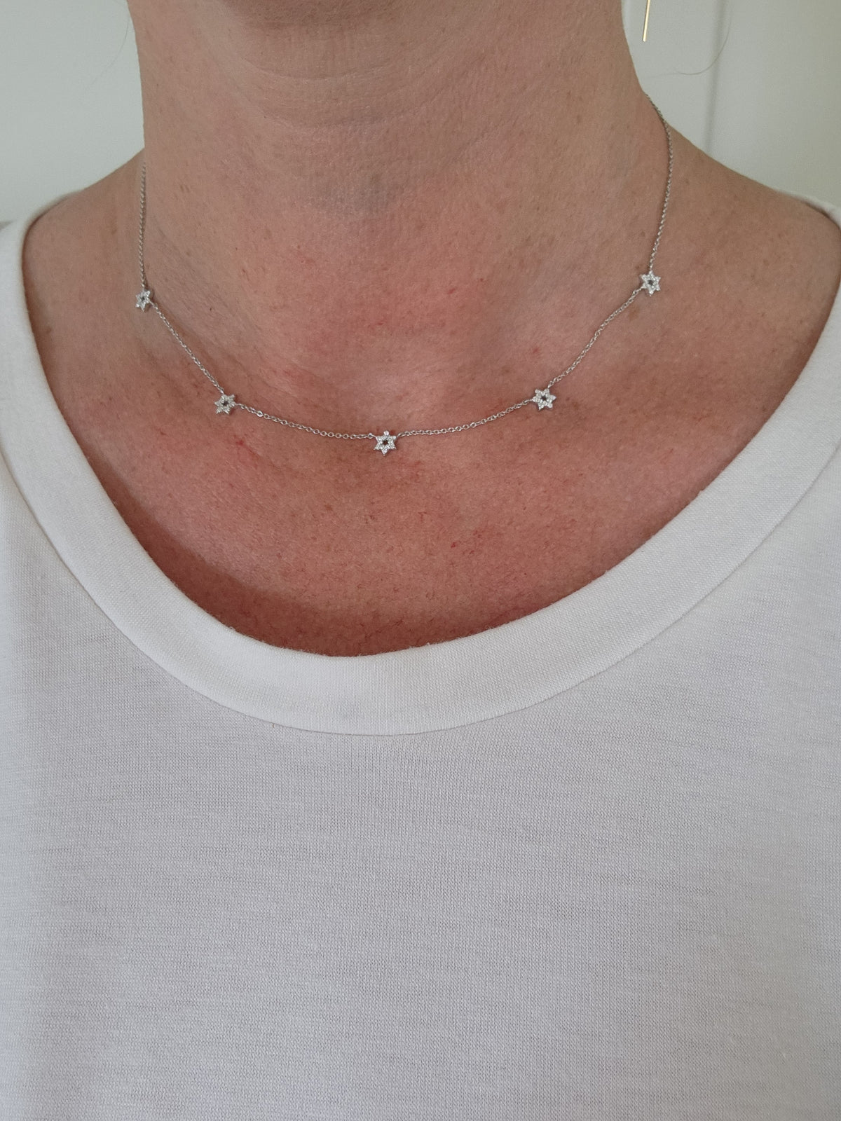 Five star of David necklace 14k gold set with diamonds.