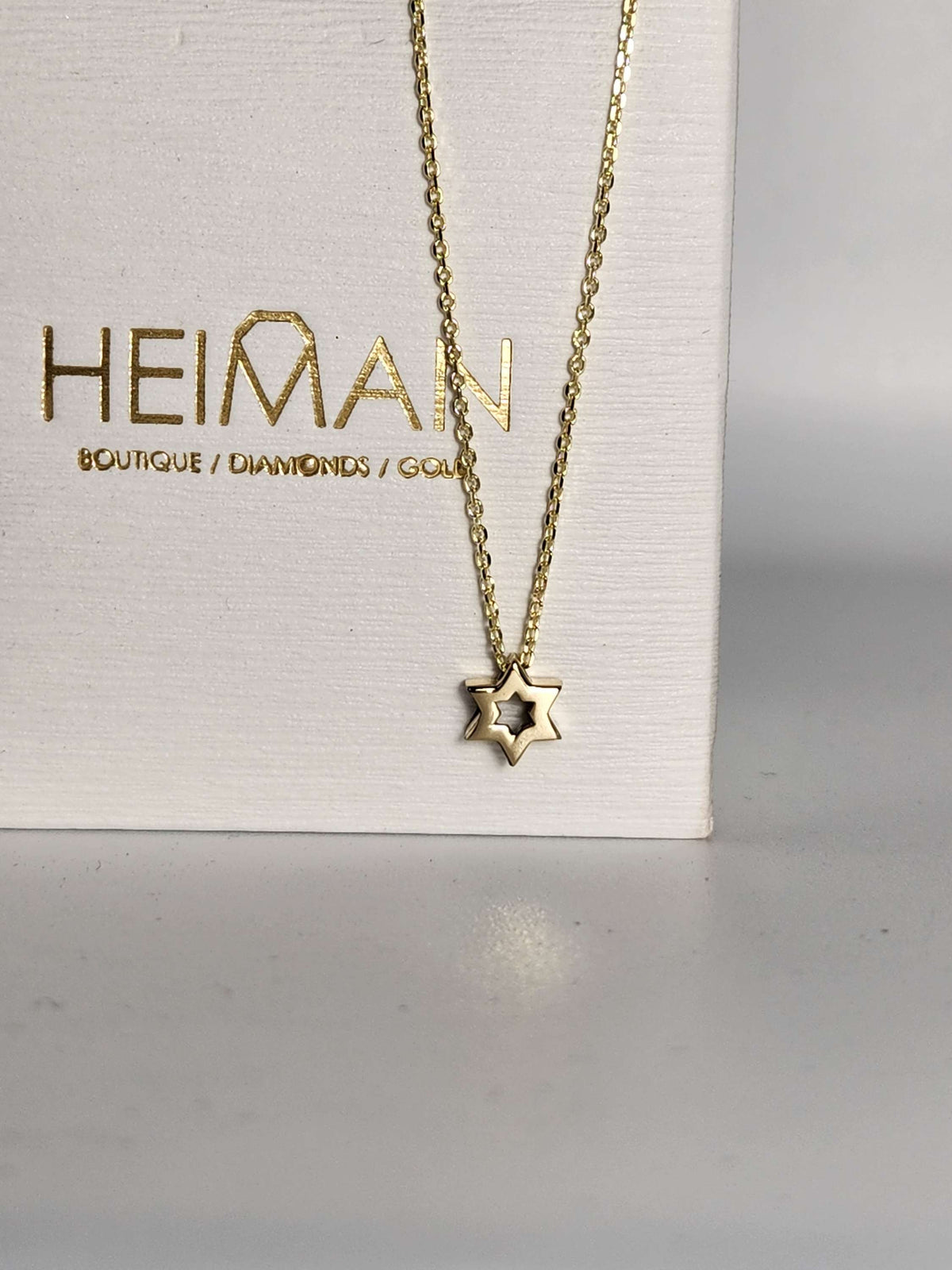 Mini Star of David necklace 7mm wide 14k,  comes on 14k chain.