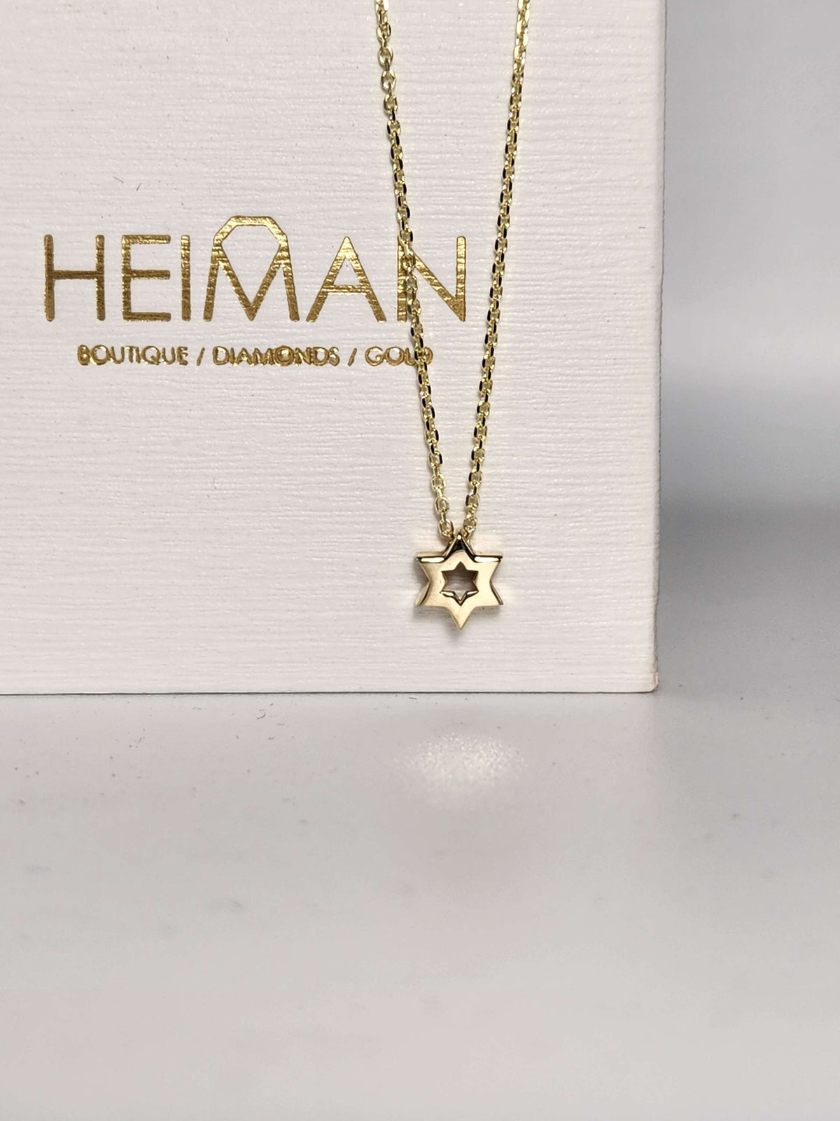 Mini Star of David necklace 7mm wide 14k,  comes on 14k chain.