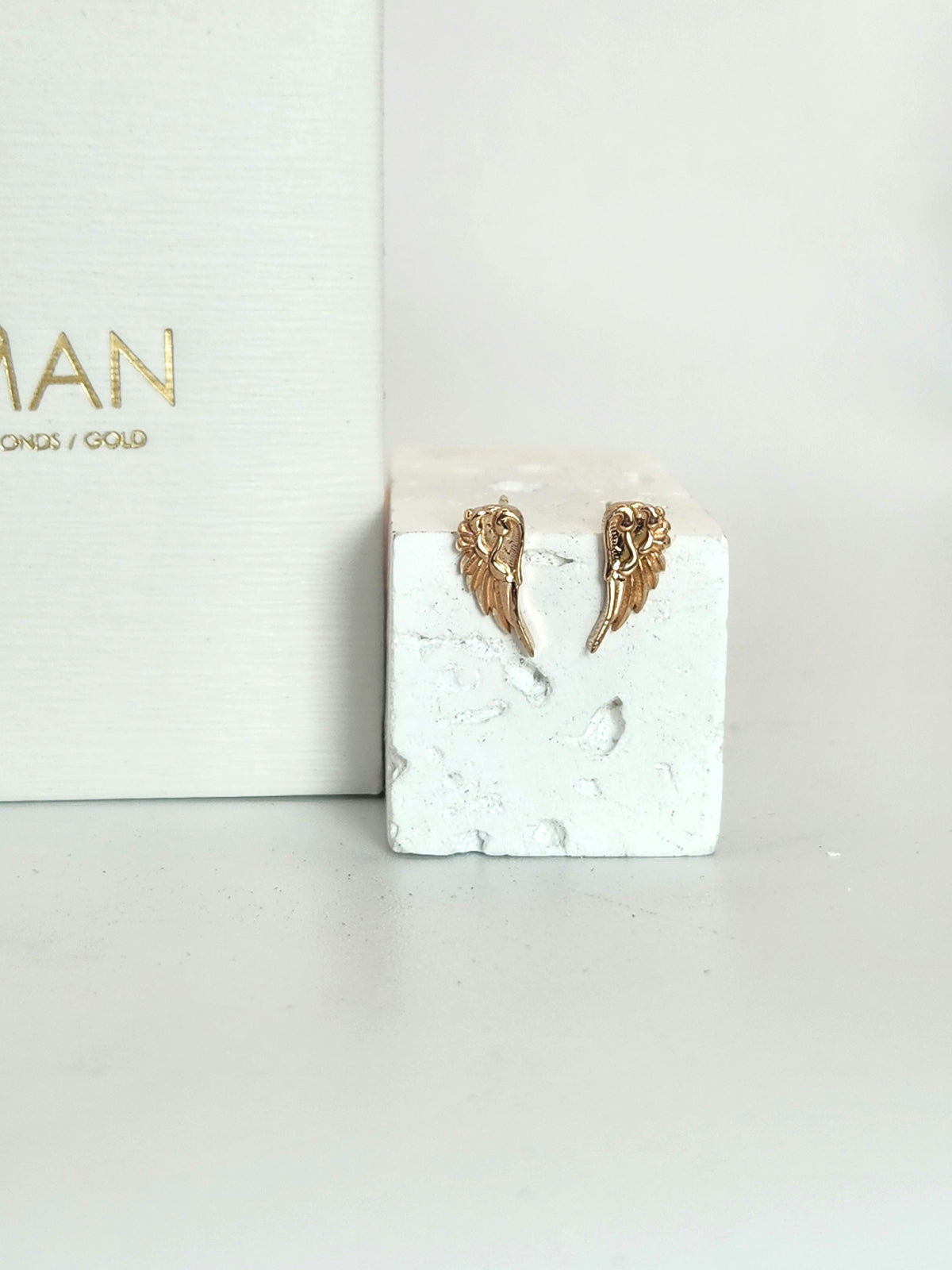 Wing stud earrings 14k rose gold.