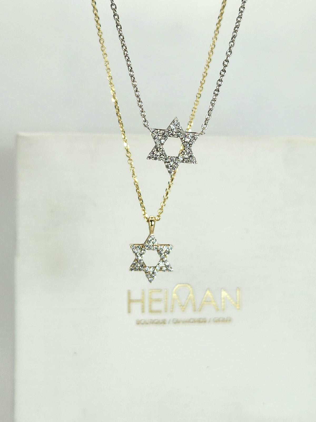 מגן דוד משובץ יהלומים זהב צהוב 14k מגיעה עם שרשרת.