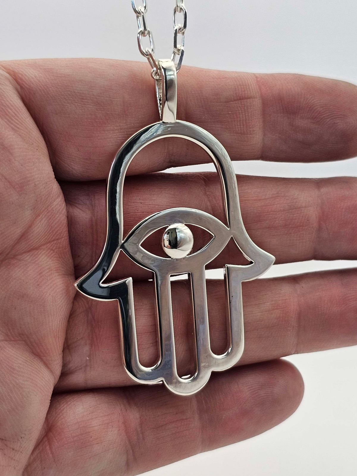 Big 925 silver Hamsa pendant come on a long silver chain