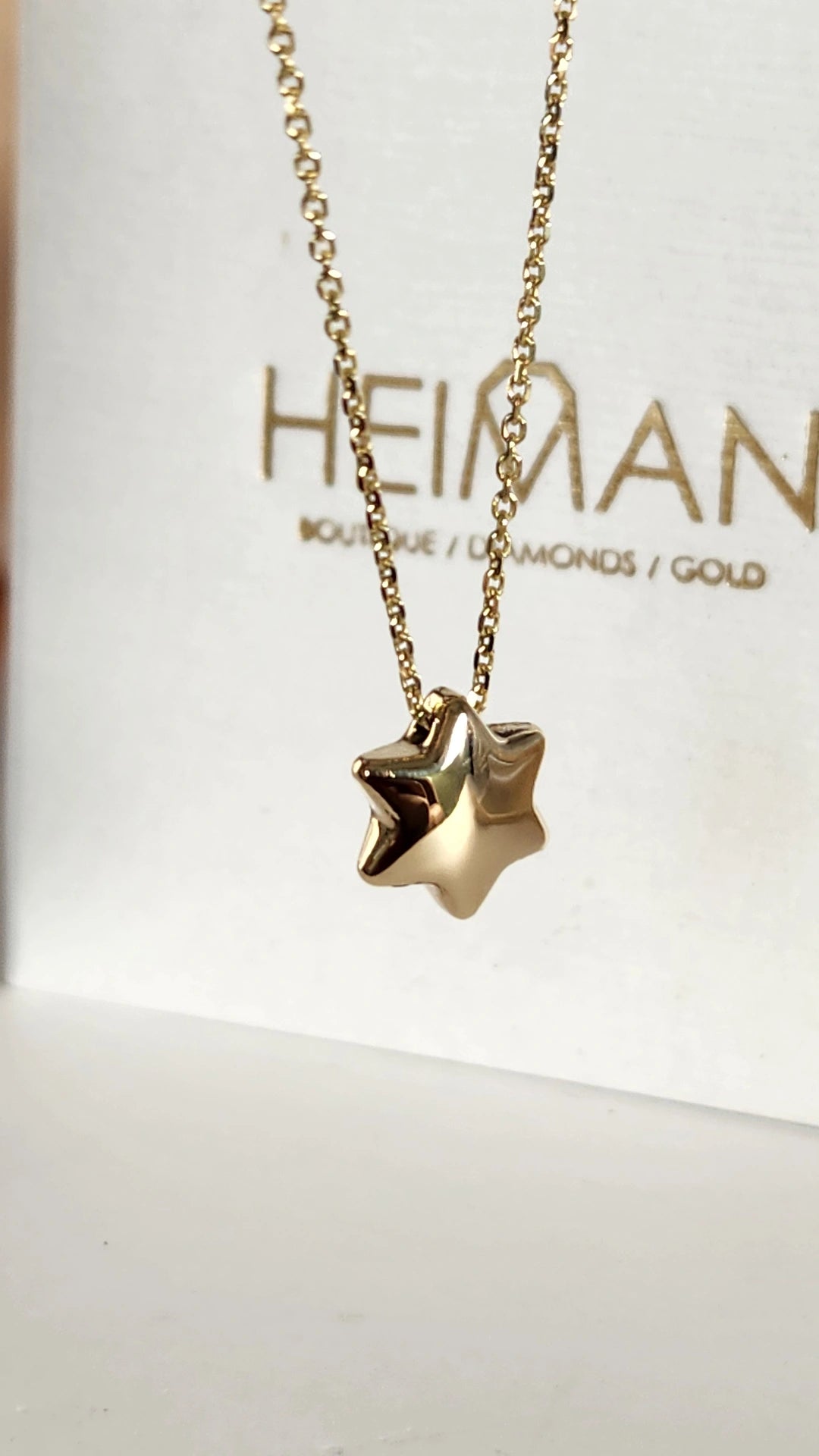 Bubble Star david necklace comes on 18 inch 14k chain.