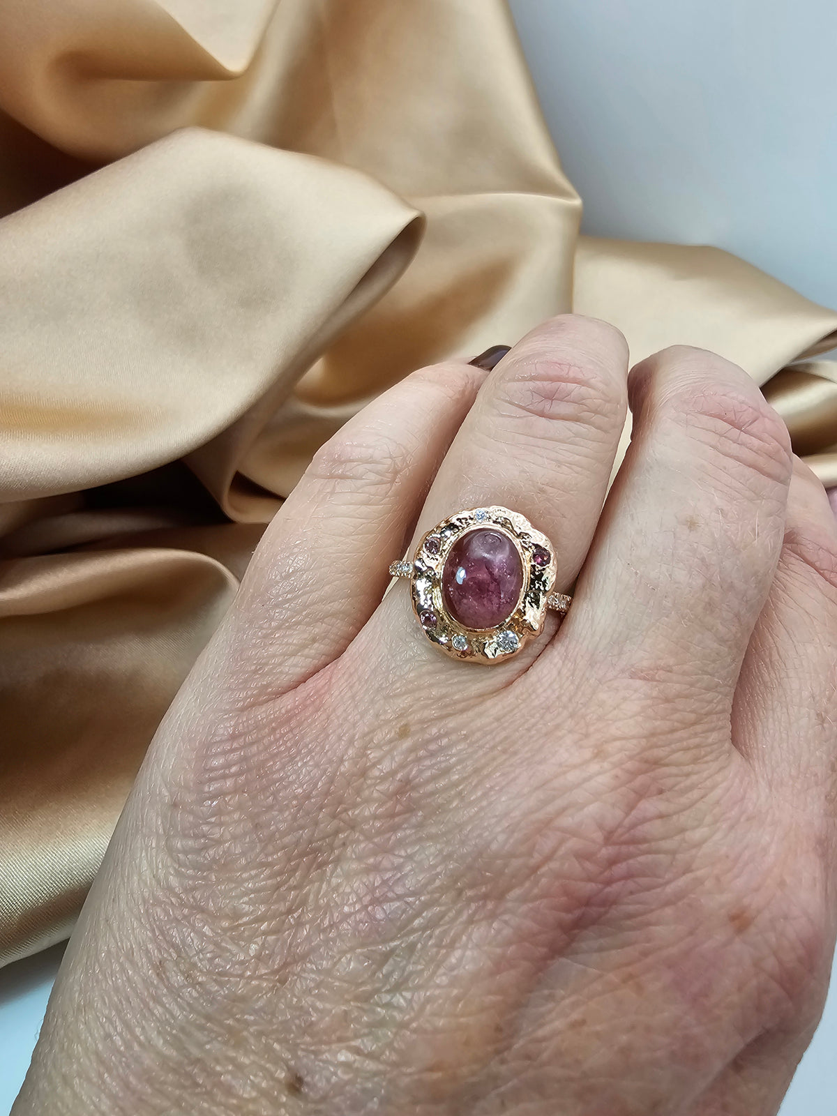 Pink tourmaline ring, 14k rose gold set with natural tourmaline and diamonds.