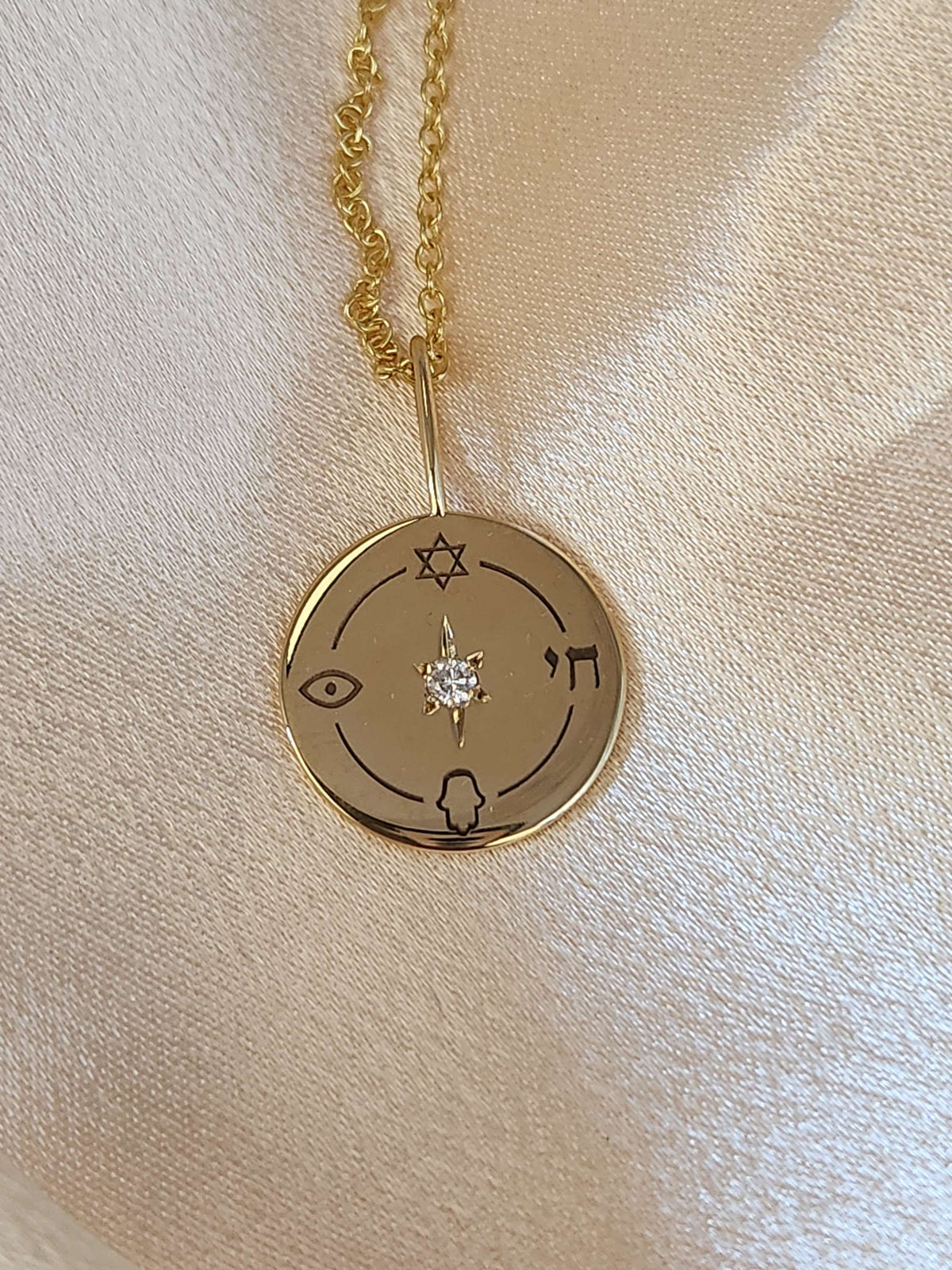 The "Jewish compas" only the pendant 14k