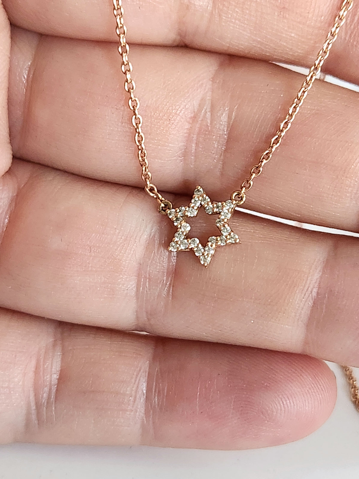 Star of David necklace 14k set with natural diamonds 0.17 carat.