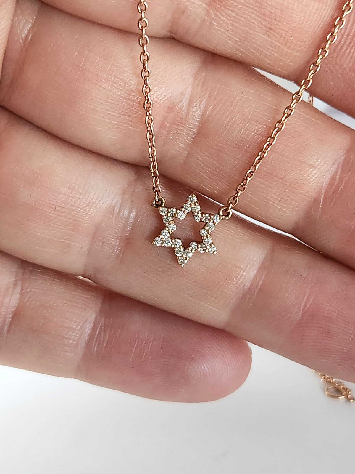 Star of David necklace 14k set with natural diamonds 0.17 carat.