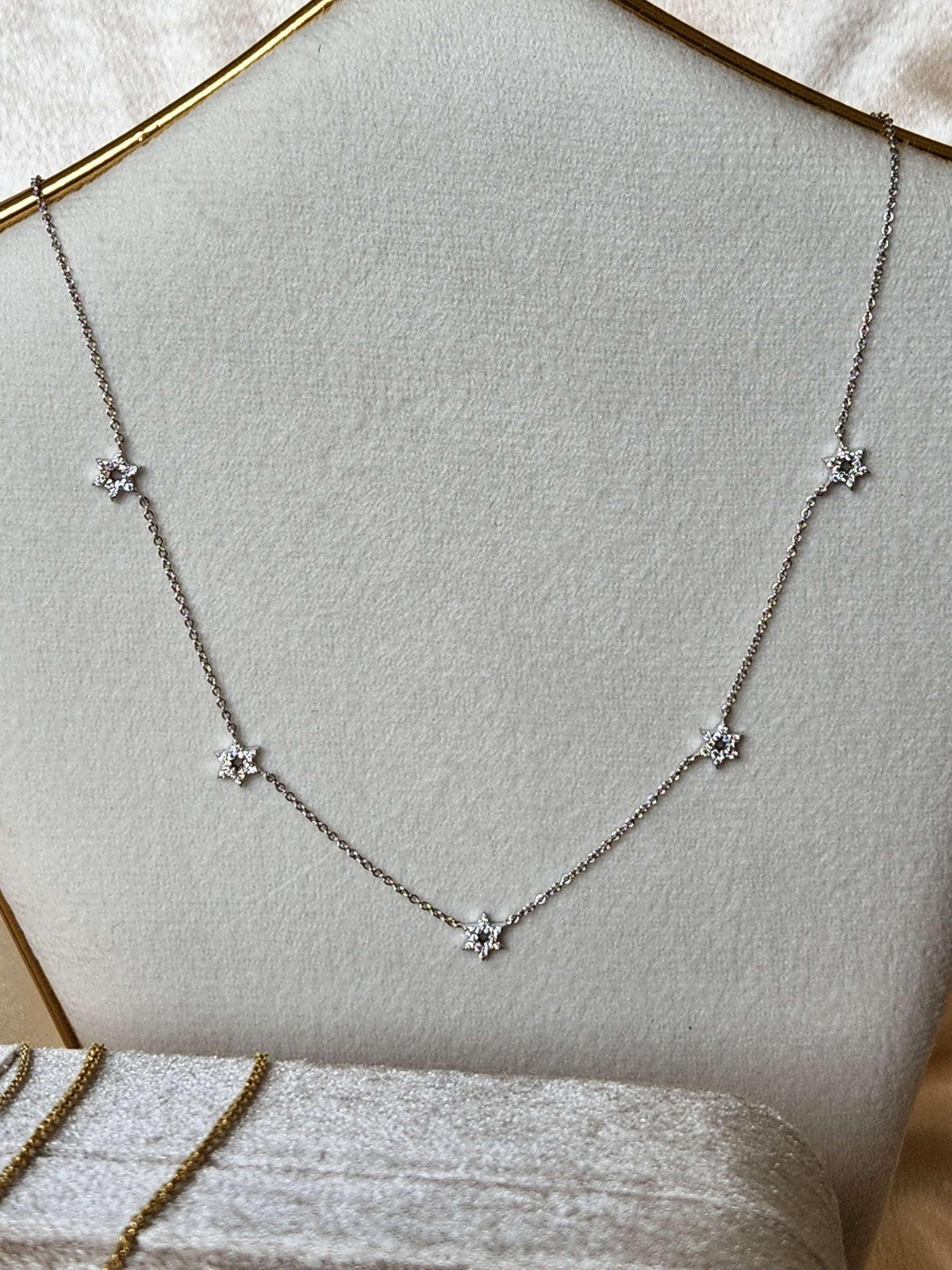 Five star of David necklace 14k gold set with diamonds.
