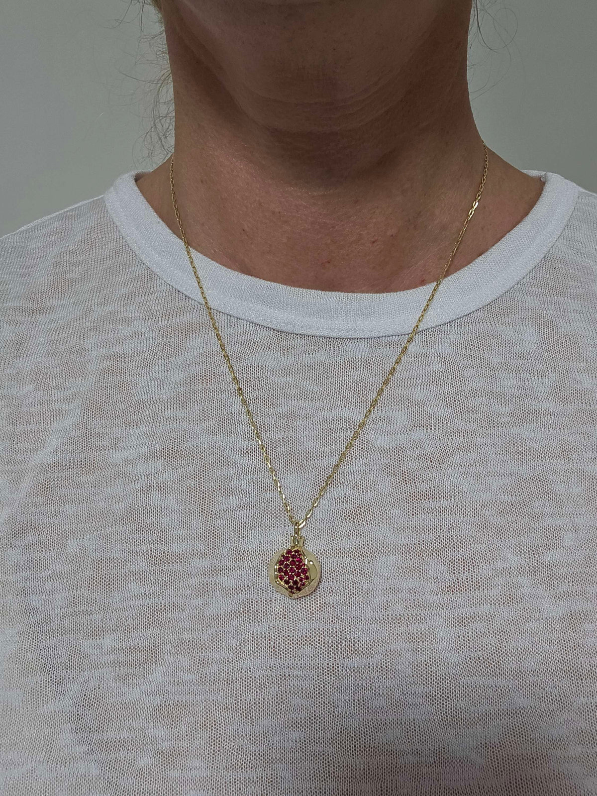 Large pomegranate pendant without a chain pendant only 14k gold set with ruby.