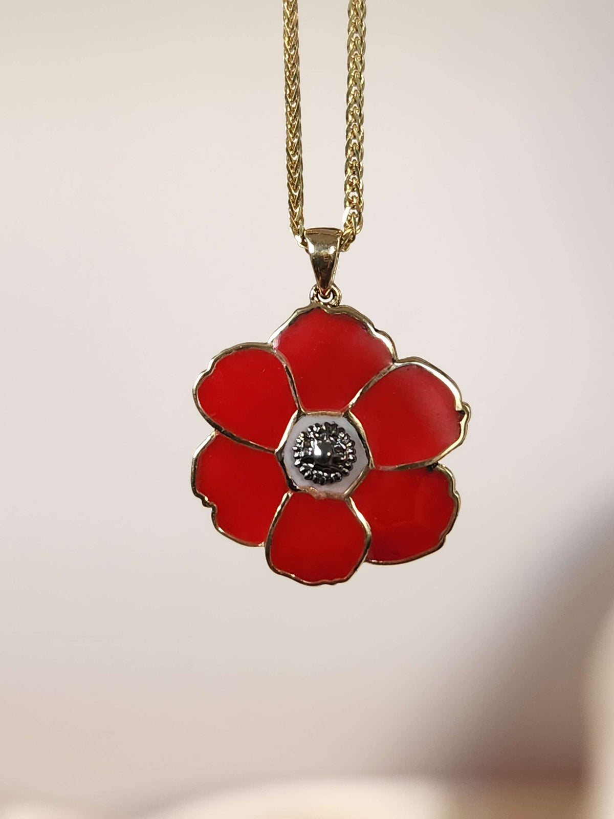 Poppyseed pendant,  14k yellow gold and enamel, comes on 14k chain.