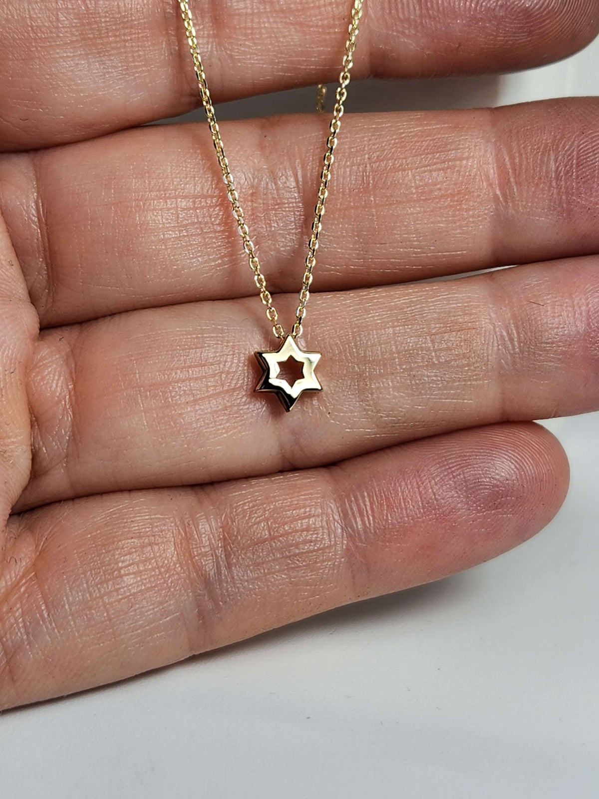 Mini Star of David necklace 7mm wide 14k,  comes on 14k chain.