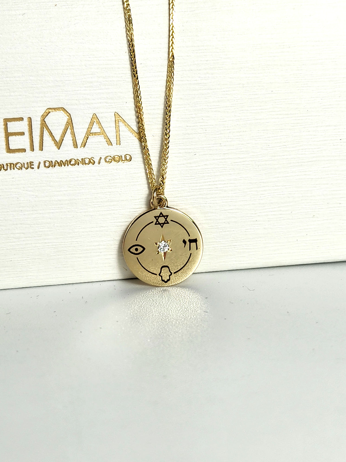 Small "Jewish compas" necklace, 14k gold set with natural diamond.