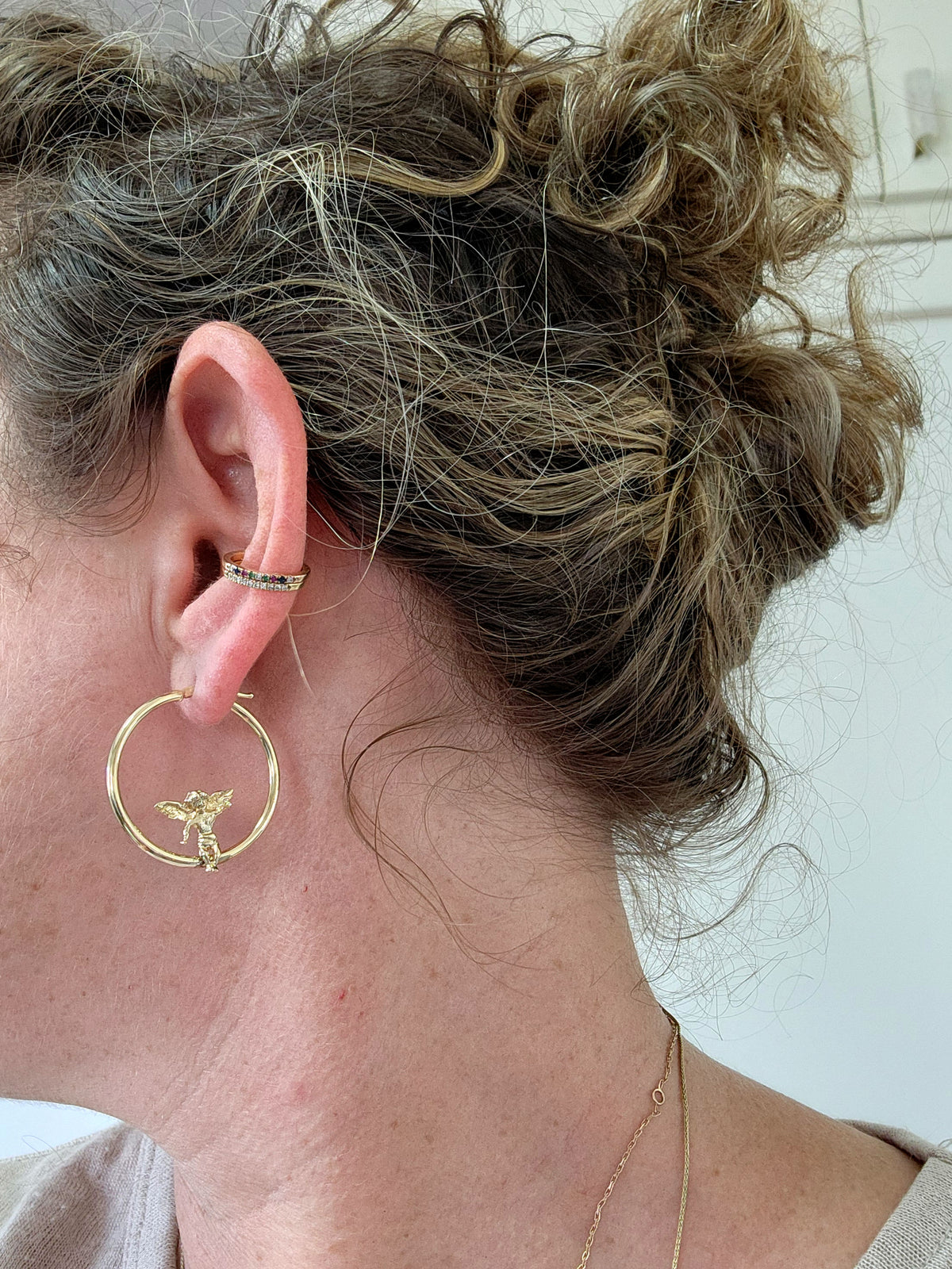 Angel hoop earrings 14k yellow gold.