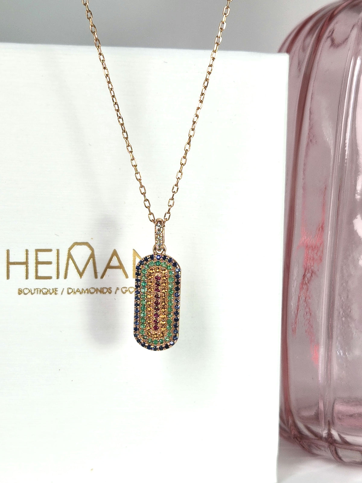 Gold tag necklace set with multi colored stones and diamonds 14k