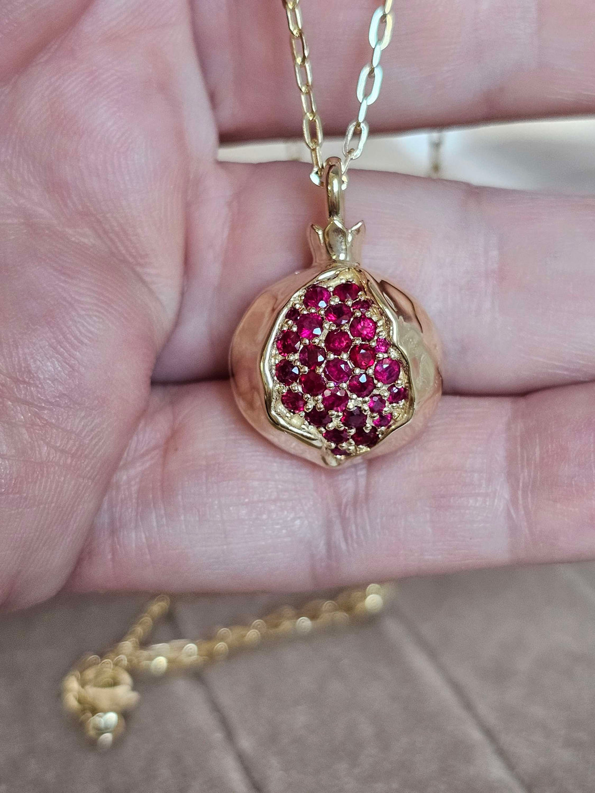 Large pomegranate pendant without a chain pendant only 14k gold set with ruby.