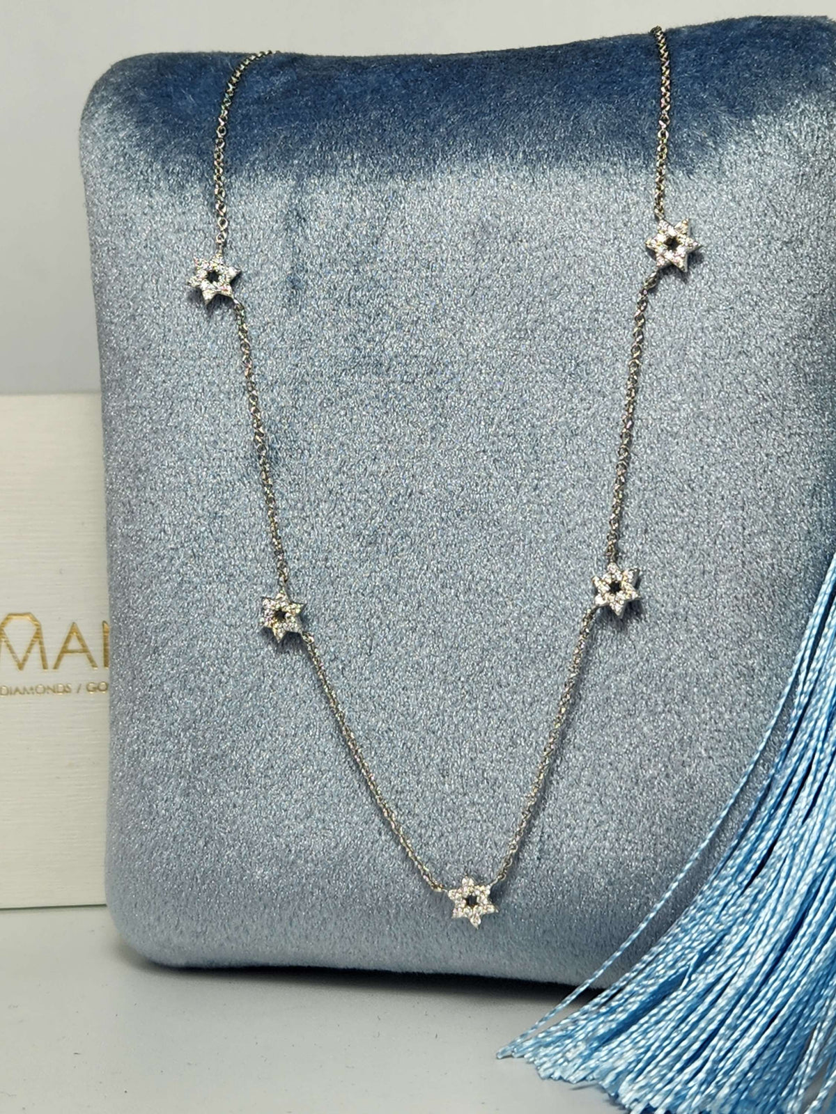 Five star of David necklace 14k gold set with diamonds.