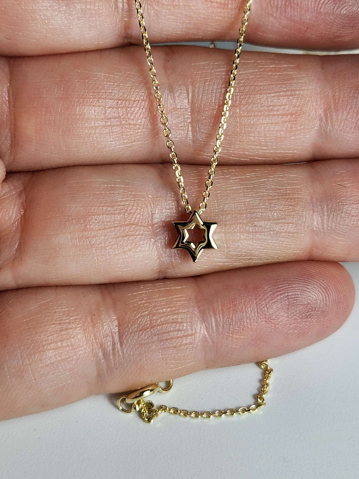 Mini Star of David necklace 7mm wide 14k,  comes on 14k chain.