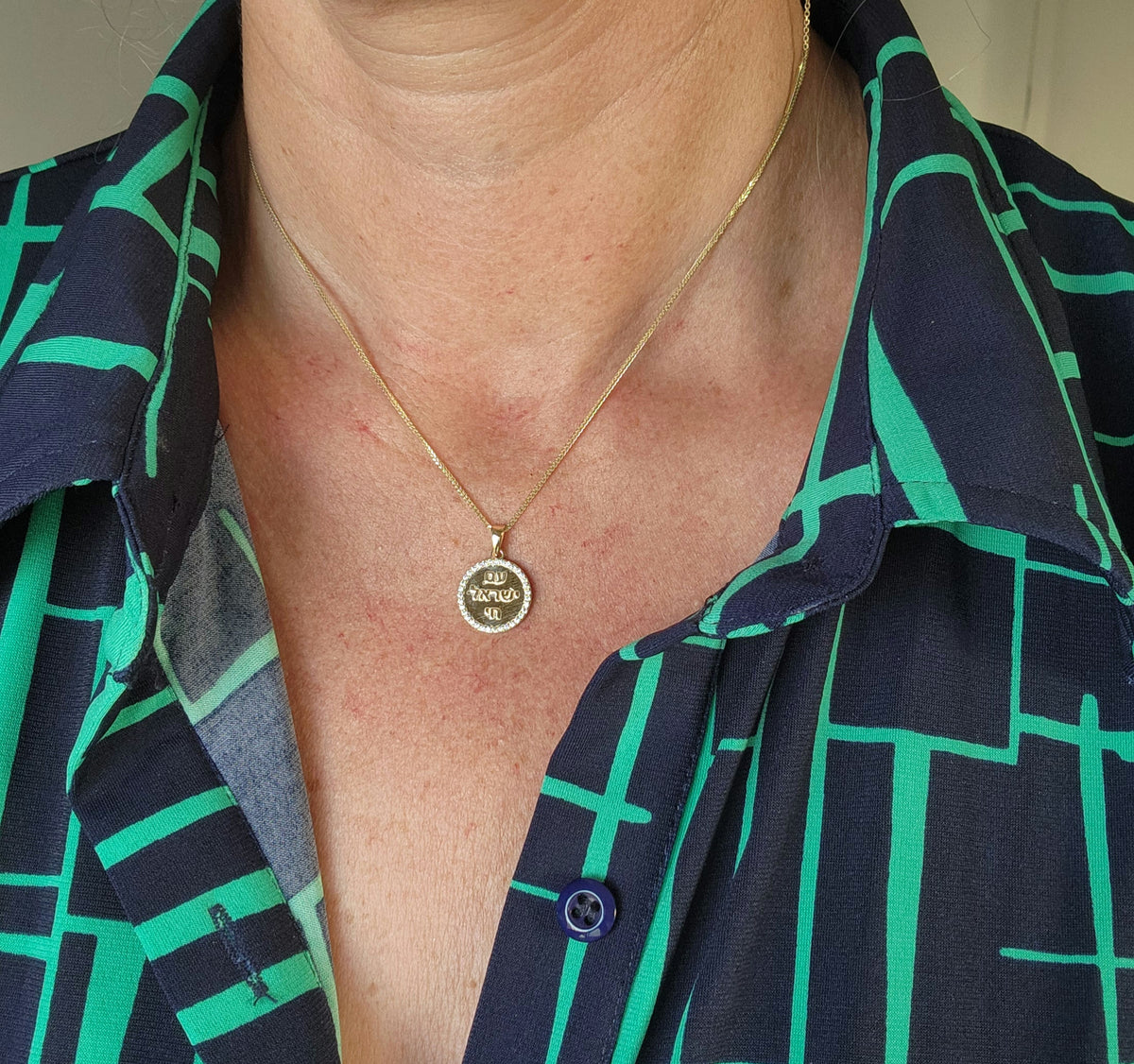 Am Israel Hai 14k gold pendant set with cvd diamonds on a 14k chain.