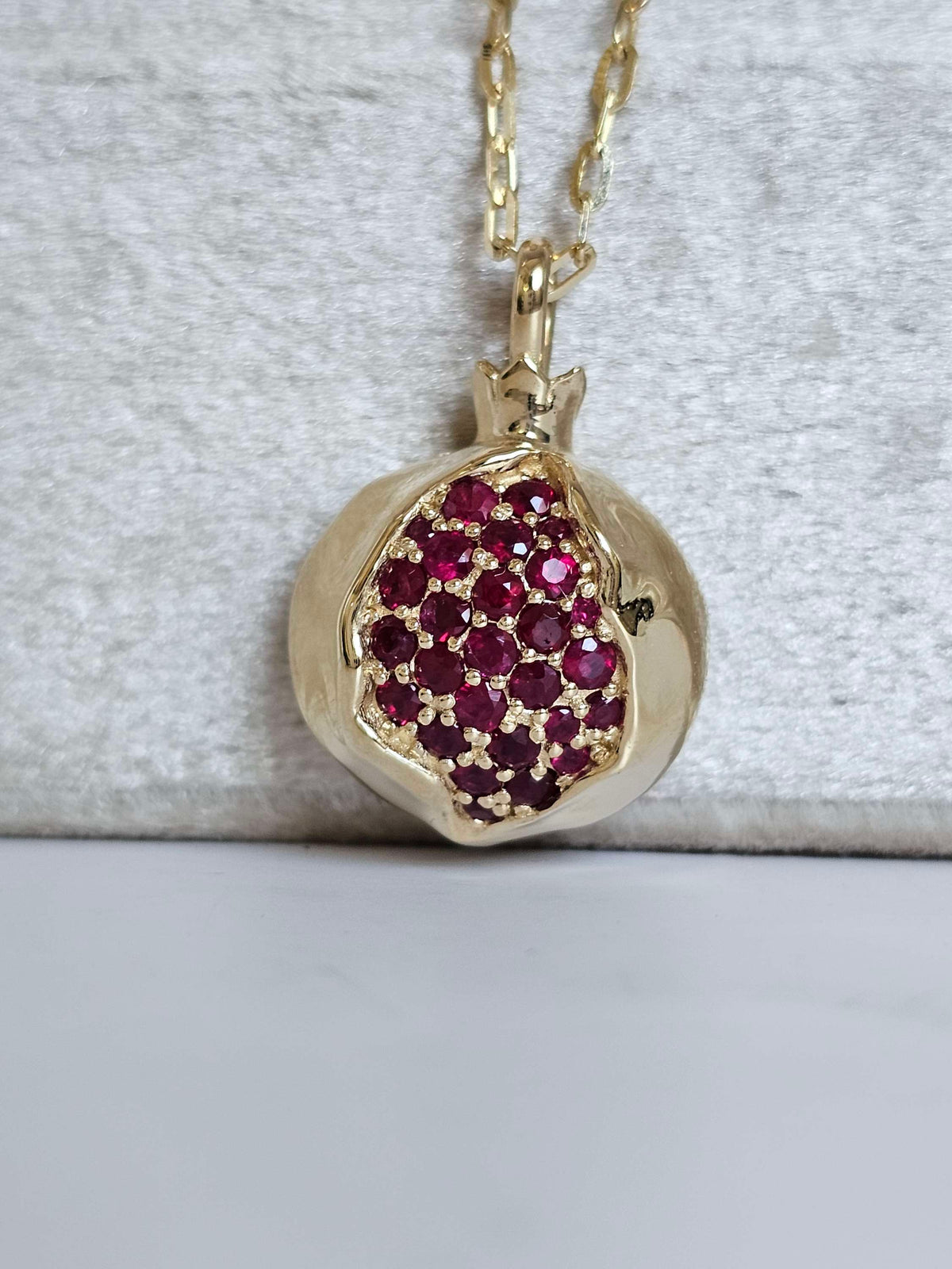 Large pomegranate pendant without a chain pendant only 14k gold set with ruby.